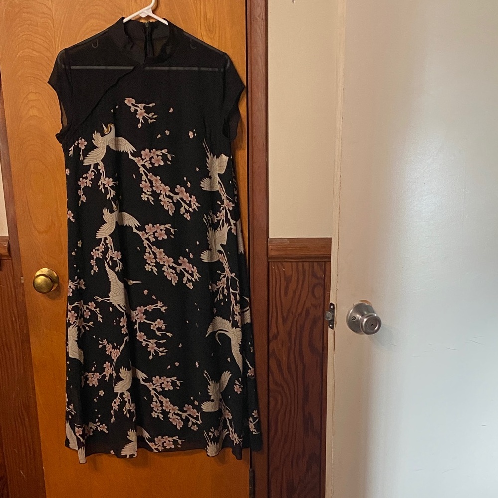 Elegant Black Dress with Crane and Floral Design